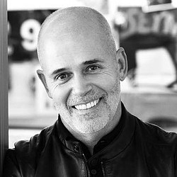 A man smiling for the camera.