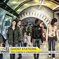 A group of people standing in a hallway.