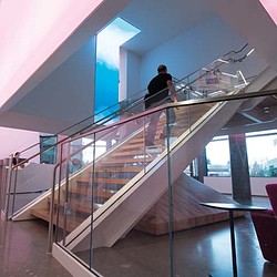 A person walking up a staircase.