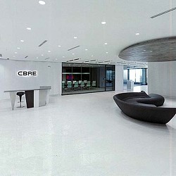 A room with a couch and a table.