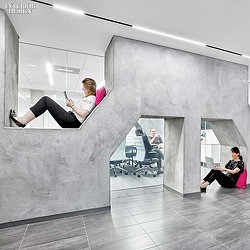 A man sitting on a staircase.