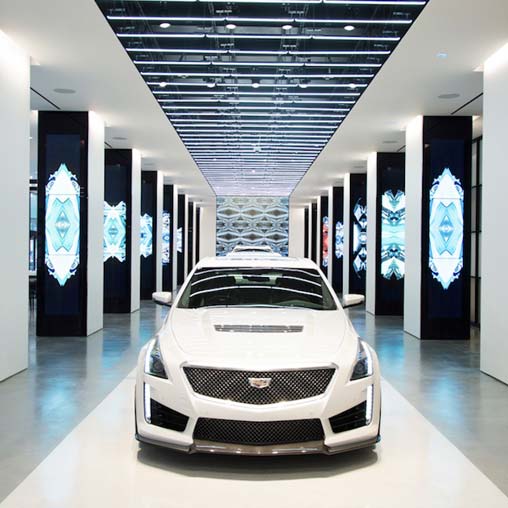 A white car in a building.