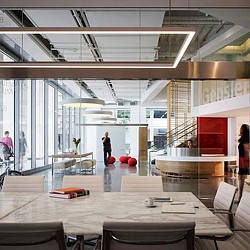A room with tables and chairs.