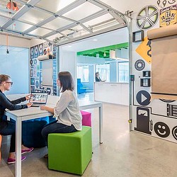 A few people sitting at a table.