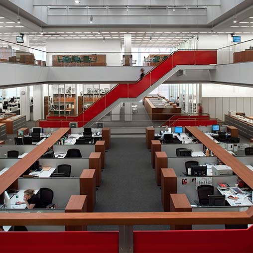 A large room with tables and chairs.