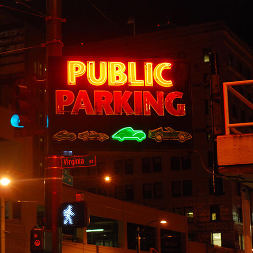 A neon sign on a building.