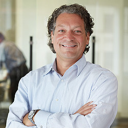 A man with his arms crossed.