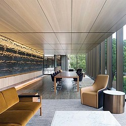 A room with a table and chairs.