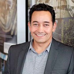 A man smiling for the camera.