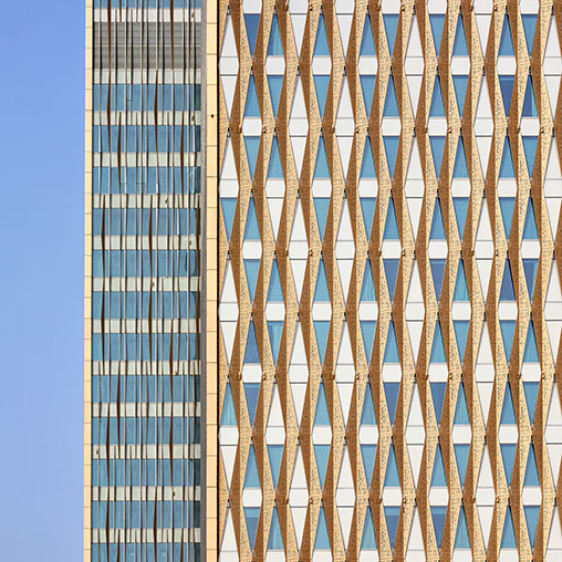 A tall building with many windows.