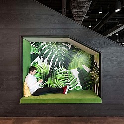 A person sitting on a couch.