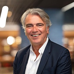 A man smiling for the camera.