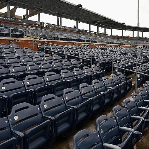 Rows of empty chairs.