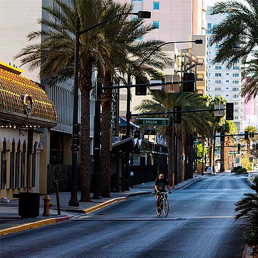 A person riding a bicycle on a street.