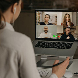 A person using a laptop.