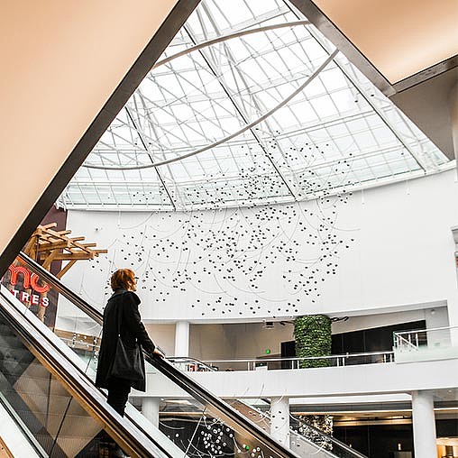 A person walking down a flight of stairs.