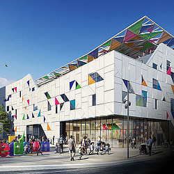 A building with flags on the roof.