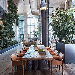 A table with chairs around it.