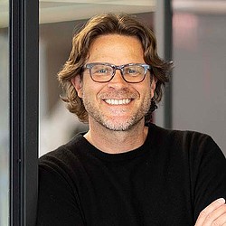 A man wearing glasses.