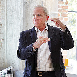 A person with the hands up.