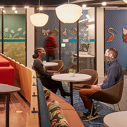 A man and woman sitting at a table.