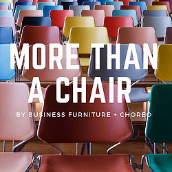 A group of chairs with a sign.