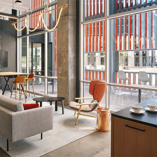 A room with tables and chairs.