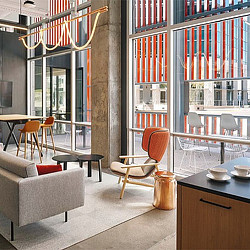 A room with tables and chairs.