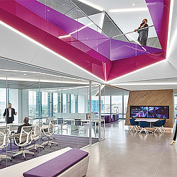 A room with people and chairs.