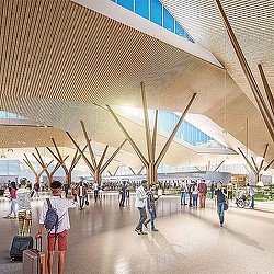 People with luggage under a covered area.