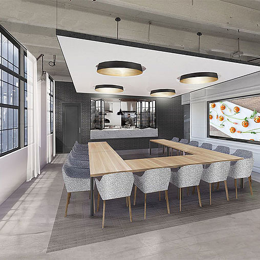 A kitchen with a bar and chairs.