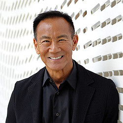 A man smiling for the camera.