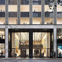 A building with a large glass front.