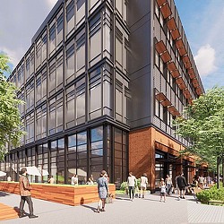 People walking outside of a building.