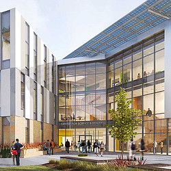 A group of people outside of a building.