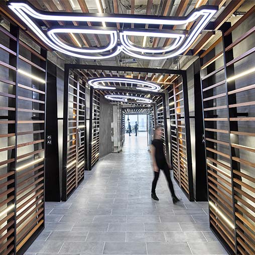 A person walking through a hallway.
