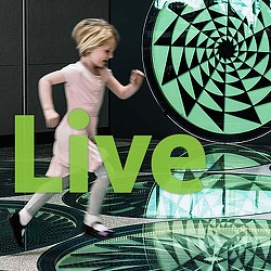 A child standing on a green surface.