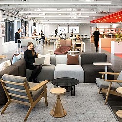 A person sitting on a couch.