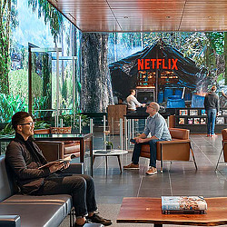 A couple of men sitting in chairs.