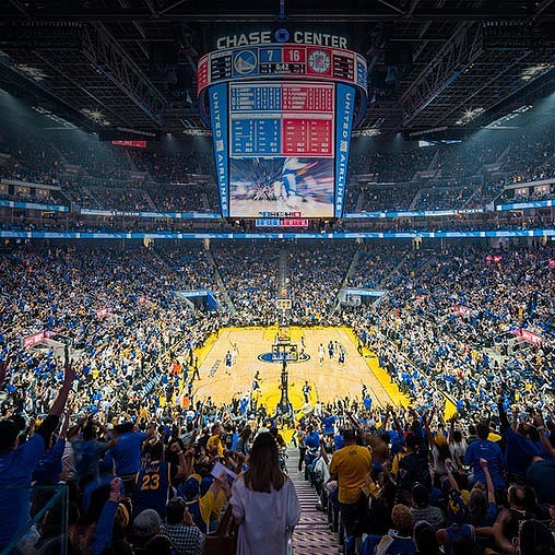 A crowd of people in a stadium.