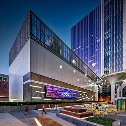 A building with a large glass front.