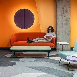 A person sitting on a couch.