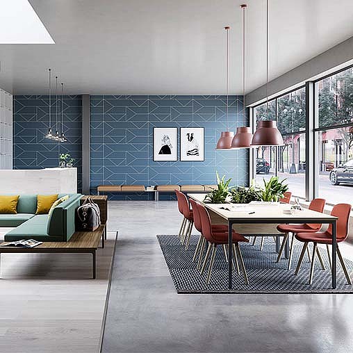 A room with a table chairs and a couch.