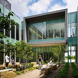 A group of people outside of a building.