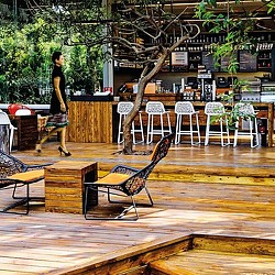 A person walking on a deck.