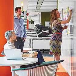 A group of people in a room.