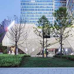 A building with a large glass window.