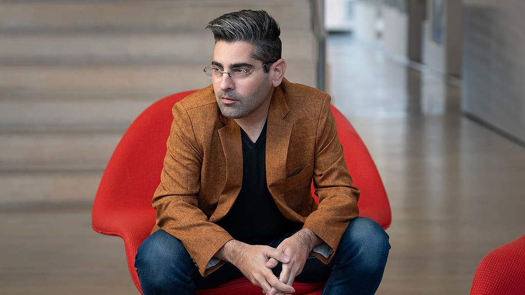 A man sitting in a chair.