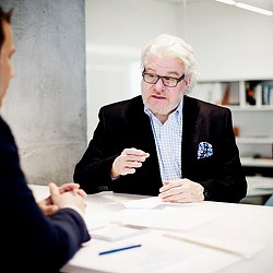 A person sitting at a table.