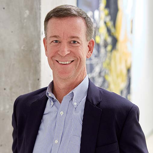 A man smiling for the camera.